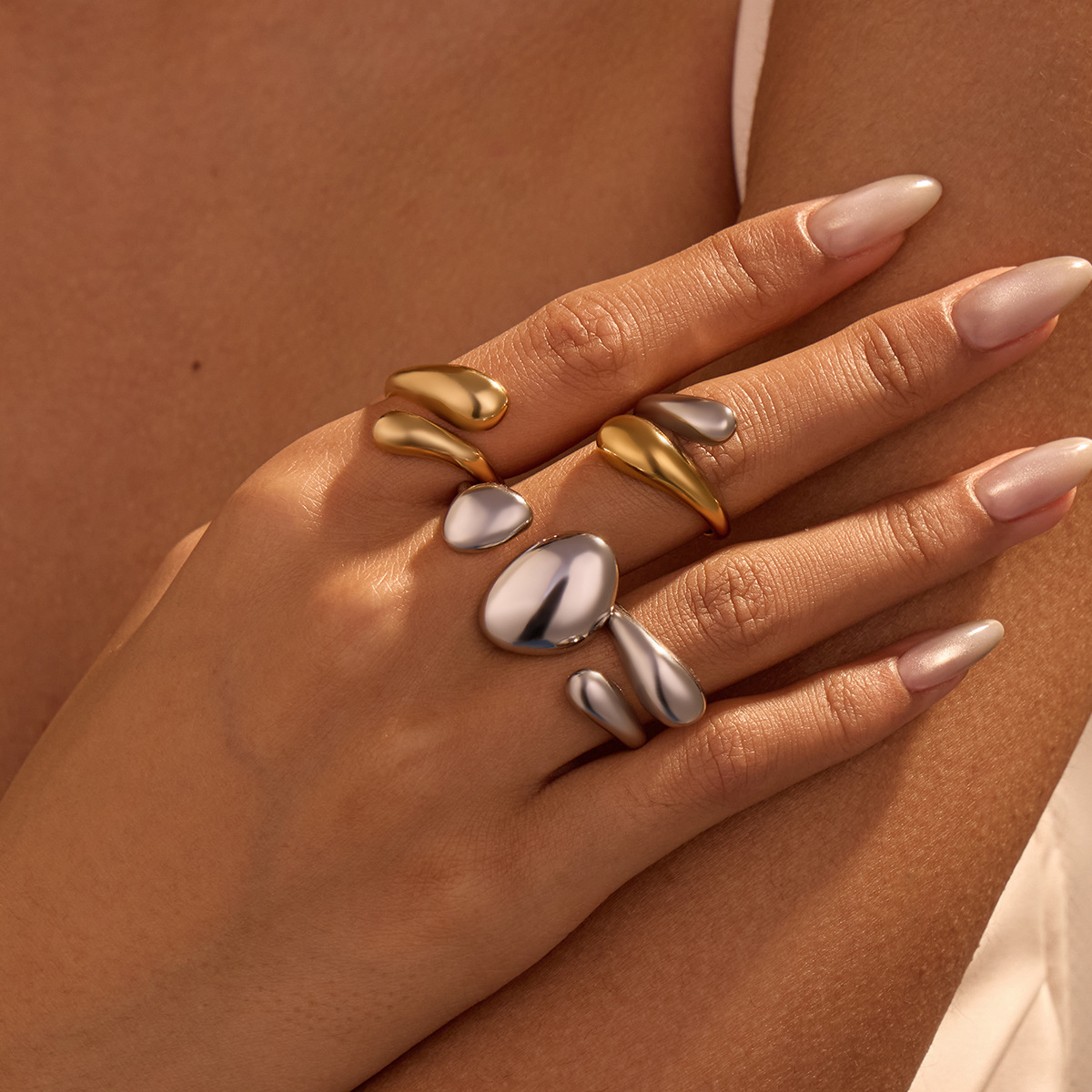 European Minimalist Stainless Steel Hollow Waterdrop Ring